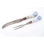 Mid-18th century Continental blue and white moulded porcelain-handled knife and fork decorated with