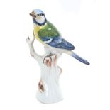 20th century Meissen figure of a blue tit on a tree stump - blue crossed swords,