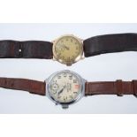 1930s gentlemen's 9ct gold wristwatch in circular case with integral lugs on leather strap and