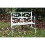 19th century white painted wrought iron garden bench with high X-frame back and reeded uprights,