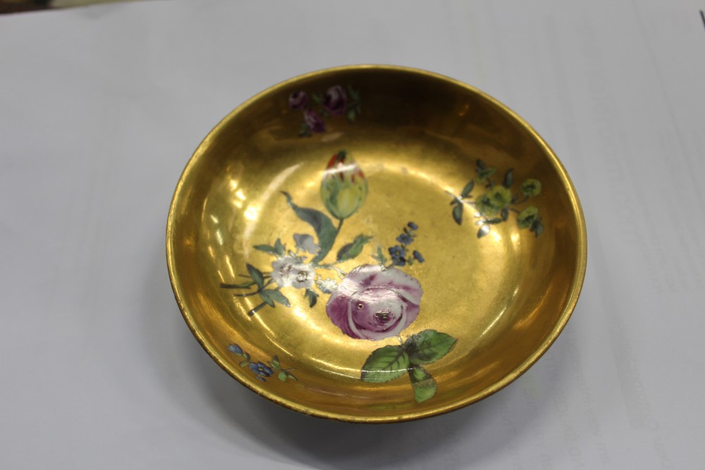 Mid-18th century Meissen gold ground tea cup and saucer with polychrome painted floral sprays - - Image 6 of 6
