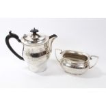 George V silver coffee pot of bellied form,