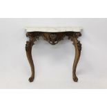 Early Victorian rosewood console table with serpentine-shaped variegated white marble top on floral