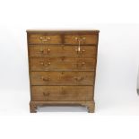 George III oak tall chest in two parts, having two short over four graduated drawers,