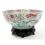 Mid-18th century Chinese export famille rose punch bowl, polychrome painted with continuous scene,