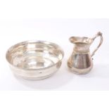 Egyptian silver cream jug of baluster form,