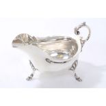 Victorian silver sauce boat of conventional form,