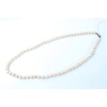 Cultured pearl necklace with a single string of cultured baroque pearls measuring approximately 7.