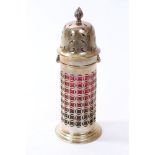 Victorian silver sugar caster of lighthouse form, with diaper work decoration,