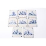 Eight 18th century Delft blue and white tiles with painted figures - including fishermen