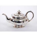 George IV silver teapot of melon form, with fluted panels and reeded border,