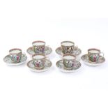 Six late 19th century Cantonese tea cups and saucers with painted figures,