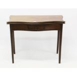 George III mahogany serpentine tea table with fold-over moulded top and frieze drawer,