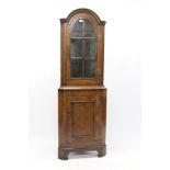 Good quality Queen Anne-style framed walnut standing corner cupboard with arched glazed section and