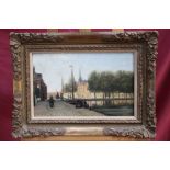 19th century Dutch school oil on panel, figures and a barge on the canal, indistinctly signed,