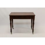 Victorian mahogany side table with two frieze drawers on ring turned legs and castors,