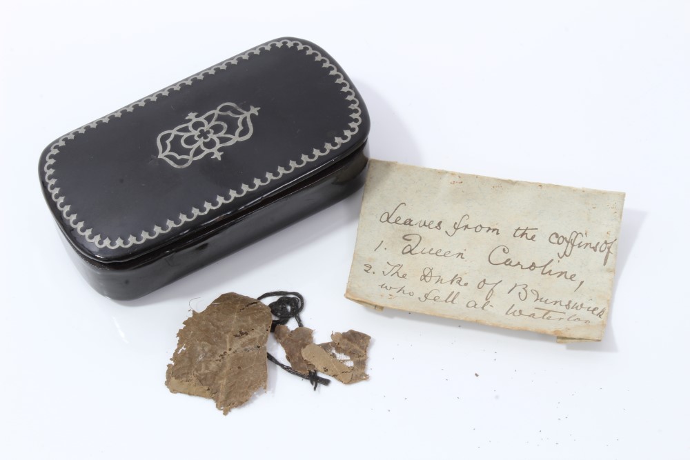 A Memento of Queen Caroline: Georgian black lacquer and pewter inlaid snuff box containing a