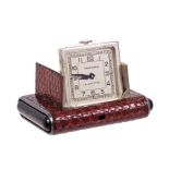 1930s Art Deco Tavannes travelling watch in snake skin covered silver case with end pushers to open
