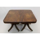 Unusual George III / IV twin pedestal dining table, rounded rectangular top with reeded edge,