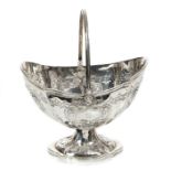 Victorian silver sugar basket of inverted helmet form,