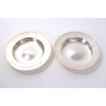 Pair Millennium silver dishes of circular form,