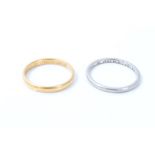 Platinum wedding ring. Size O½ and a 22ct gold wedding ring.