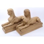 Pair 20th century impressive plaster Egyptian Sphinxs with painted patinated finish,