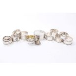 Nine silver napkin rings (various dates and makers), a silver bangle (Chester 1936),