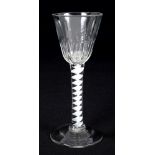 Mid-18th century wine glass with fluted moulded bowl on opaque twist stem on splayed foot, 15.