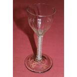 Mid-18th century wine glass with drawn-fluted bowl, on opaque double-twist stem on splayed foot,