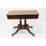 Good Regency rosewood and brass inlaid card table,