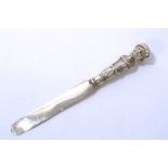 Victorian silver novelty paper knife with figurative handle and silver blade (London 1838),