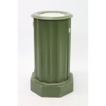 Antique green painted column with marble top and shelved interior enclosed by flush door on