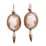 Pair Victorian cameo pendant earrings each with an oval carved shell cameo depicting a classical