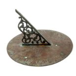 18th century-style bronze sundial with pierced gnomon and circular engraved dial,