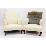 Rare pair of Victorian deep armchairs by Howard and Sons on turned front legs and castors,