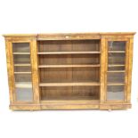 Fine Victorian figured walnut dwarf bookcase of inverted breakfront form by Gillows.