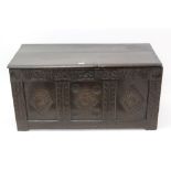 17th century and later carved oak coffer with plank lid over lunette carved frieze and
