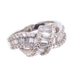 18ct white gold and diamond dress ring with a crossover design,