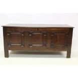 18th century oak coffer with internal candle box and triple moulded panel front, on stiles,
