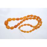 Old amber bead necklace with a string of graduated 'butterscotch' amber beads measuring