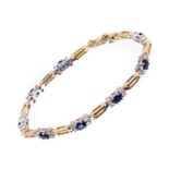 Sapphire and diamond bracelet with eight clusters,