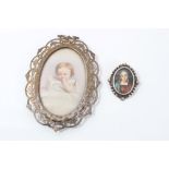 Edwardian portrait miniature of a young child, oval, in pierced silvered frame, 12cm x 8cm,