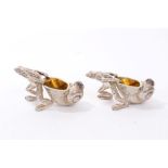 Pair novelty silver plated salts in the form of a frog pulling a large shell with silver gilt