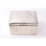 Large George V silver cigarette box of rectangular form,