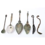 Middle Eastern bronze woad grinder spoon pierced stem and mask terminal, 15cm long,