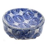 Scarce early 19th century pearlware blue and white dog bowl of circular form,
