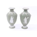 Pair late 19th century Wedgwood green Jasper ware oviform vases with applied classical actors