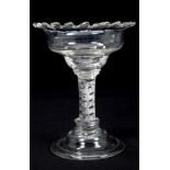 Early 18th century sweetmeat glass with castellated pan-shaped bowl on double-air-twist stem on