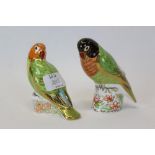 Two limited edition Royal Crown Derby paperweights - Red Faced Love Bird and Black Faced Love Bird,